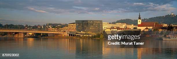 ars electronica center and danube river - linz stock pictures, royalty-free photos & images