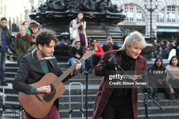 Rod Stewart seen busking at Piccadilly Circus with fellow busker Henry Facey on November 6, 2017 in London, England.