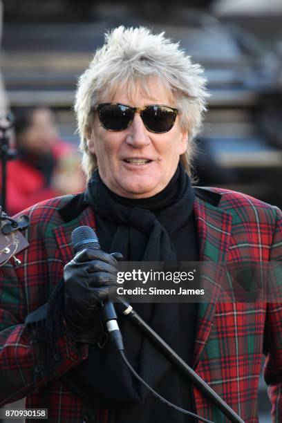 Rod Stewart seen busking at Piccadilly Circus with fellow busker Henry Facey on November 6, 2017 in London, England.