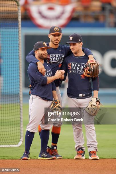 World Series: Houston Astros Jose Altuve , Carlos Correa and Alex Bregman warming up before game vs Los Angeles Dodgers at Dodger Stadium. Game 6....