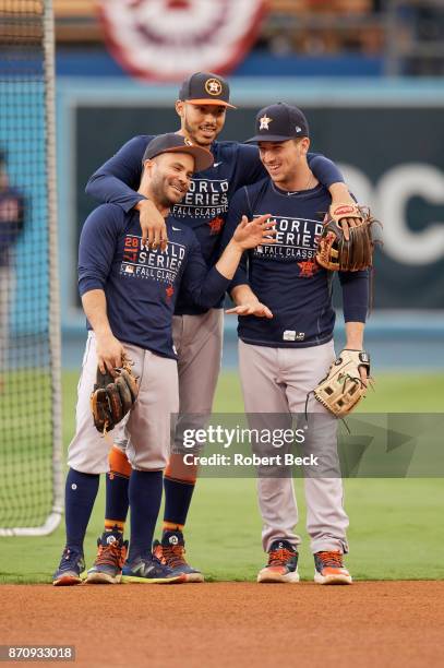 World Series: Houston Astros Jose Altuve , Carlos Correa and Alex Bregman warming up before game vs Los Angeles Dodgers at Dodger Stadium. Game 6....