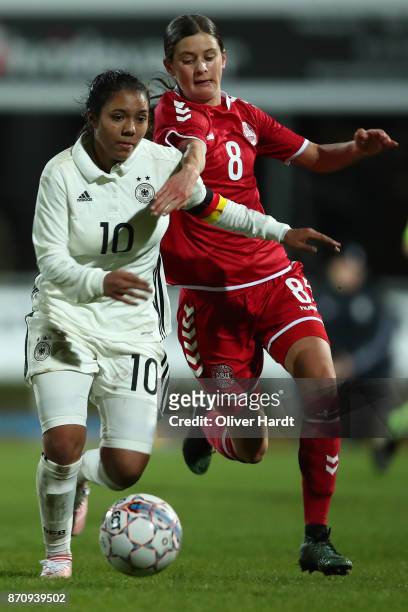 Gia Corley of Germany and Signe Carstens of Denmark compete for the ball during the U16 Girls international friendly match betwwen Denmark and...