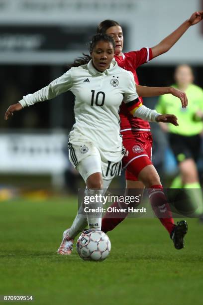 Gia Corley of Germany and Signe Carstens of Denmark compete for the ball during the U16 Girls international friendly match betwwen Denmark and...