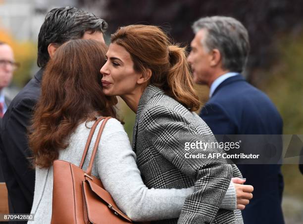 The First Lady of Argentina Juliana Awada greets another woman during a tribute to victims of the bike path terror attack in New York on November 6,...