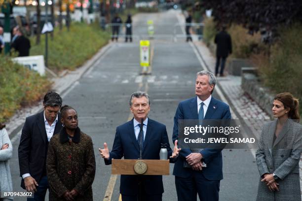 Argentina's Presidnet Mauricio Macri speaks as Frist Lady Juliana Awada , New York City Mayor Bill de Blasio and his wife Chirlane McCray listen...