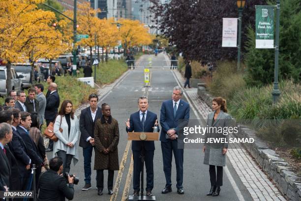 Argentina's Presidnet Mauricio Macri speaks as Frist Lady Juliana Awada , New York City Mayor Bill de Blasio and his wife Chirlane McCray listen...