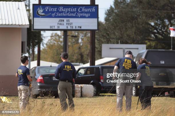 Law enforcement officials continue their investigation at the First Baptist Church of Sutherland Springs on November 6, 2017 in Sutherland Springs,...