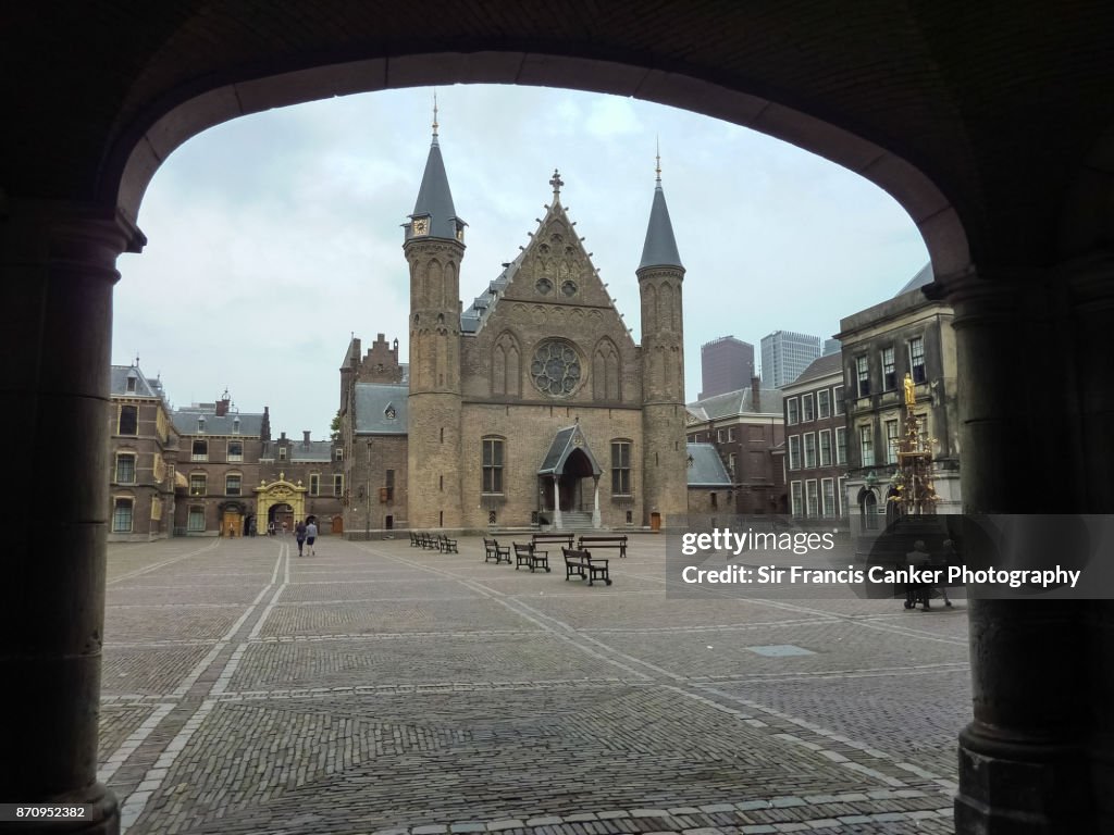 Medieval 'Ridderzaal' facade as seen from the Binnenhof's (Dutch Parliament) internal arches at dusk in The Hague, The Netherlands