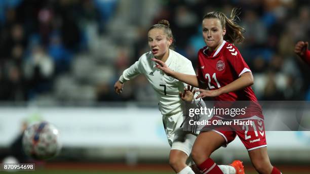 Nicole Woldmann of Germany and Emilie Pruesse of Denmark compete for the ball during the U16 Girls international friendly match betwwen Denmark and...