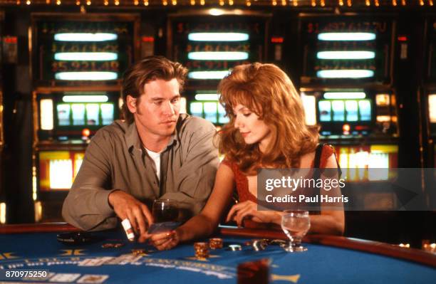 Val Kilmer and Joanne Whalley, film Kill Me Again in a casino in Las Vegas February 12, 1989 Las Vegas, Nevada .