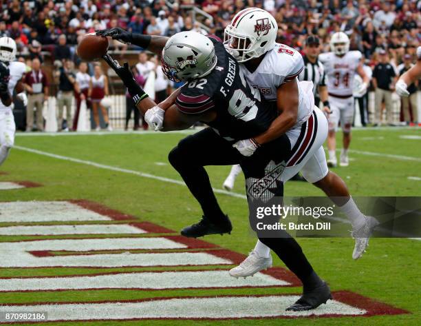 Jesse Monteiro of the Massachusetts Minutemen breaks up a pass intended for Farrod Green of the Mississippi State Bulldogs during the first half of...