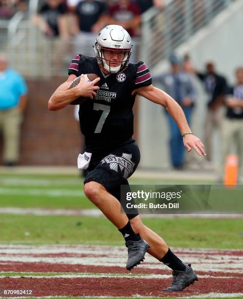 Nick Fitzgerald of the Mississippi State Bulldogs carries the ball against the Massachusetts Minutemen during the second half of an NCAA football...