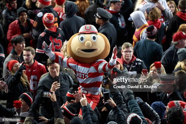 Ohio State mascot Brutus Buckeye with fans in stands during game vs Penn State at Ohio Stadium. Columbus, OH CREDIT: David E. Klutho