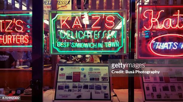 store window of famous katz's delicatessen kosher restaurant along houston street in the lower east side of manhattan - east houston street stock pictures, royalty-free photos & images