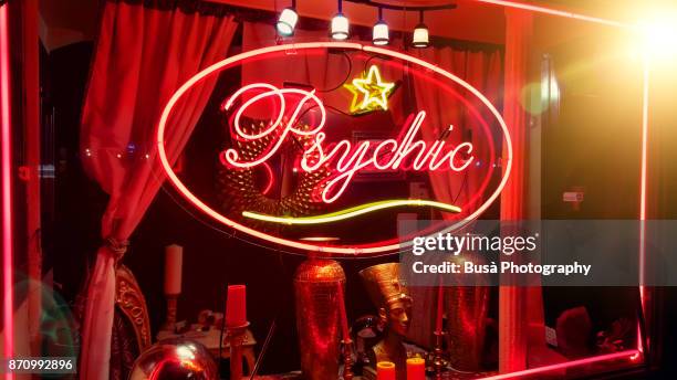 store window of a psychic parlor in the east village, manhattan, new york city - fortune telling stock pictures, royalty-free photos & images