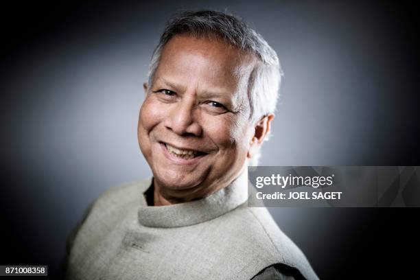 Bangladeshi economist and 2006 Nobel Peace Prize winner Muhammad Yunus poses during a photo session in Paris on November 6, 2017.