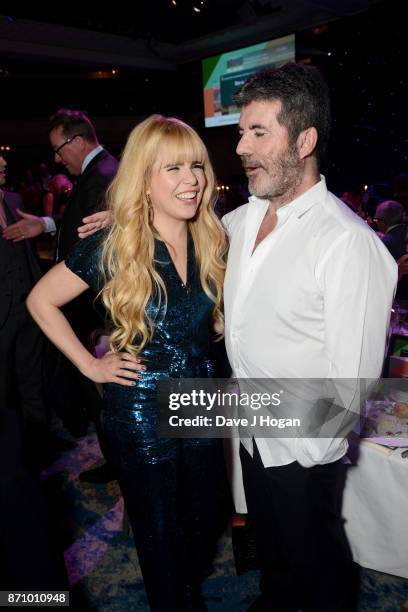 Paloma Faith and Simon Cowell attend the 26th annual Music Industry Trust Awards held at The Grosvenor House Hotel on November 6, 2017 in London,...