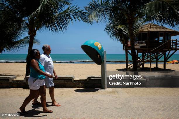 Public phone from the Brazilian telephone operator Oi SA is seen on Boa Viagem beach, a postcard of the city of Recife in northeastern Brazil, on...