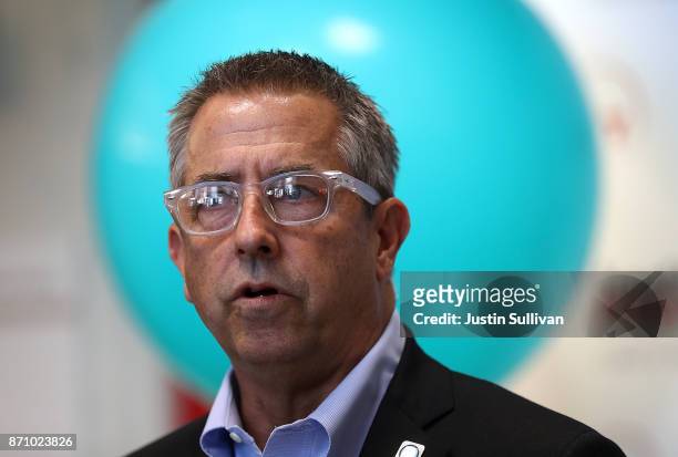 Covered California executive director Peter V. Lee speaks during a news conference at HealthRIGHT 360 on November 6, 2017 in San Francisco,...