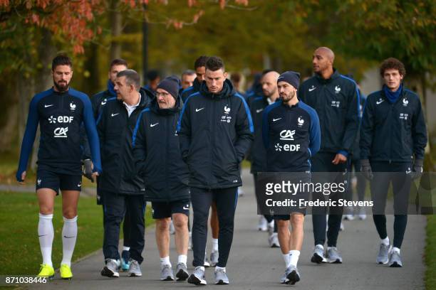 French Football Team Olivier Giroud, Laurent Koscielny, Christophe Jallet arrive for the training session on November 6, 2017 in Clairefontaine,...