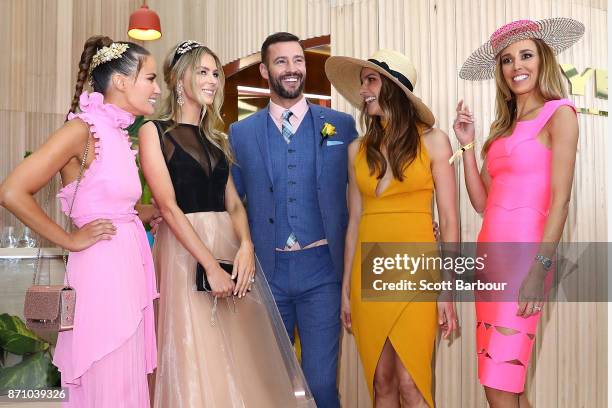 Jodi Gordon, Jennifer Hawkins, Kris Smith, Rachel Finch and Rebecca Judd attend the MYER Marquee on Melbourne Cup Day at Flemington Racecourse on...