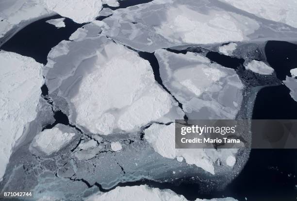 Sea ice is viewed aboard NASA's research aircraft in the Antarctic Peninsula region, on November 3 above Antarctica. NASA's Operation IceBridge has...