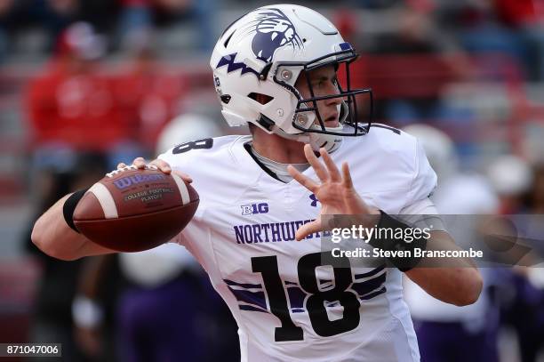 Quarterback Clayton Thorson of the Northwestern Wildcats warms up before the game against the Nebraska Cornhuskers at Memorial Stadium on November 4,...