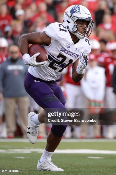 Running back Justin Jackson of the Northwestern Wildcats runs against the Nebraska Cornhuskers at Memorial Stadium on November 4, 2017 in Lincoln,...