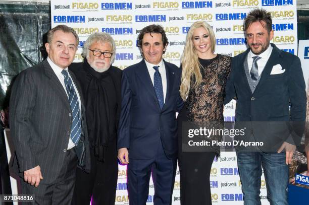 Andrea Biavardi, Roberto Rocco, Urbano Cairo, Ria Antoniou and Pietro Pizzi attend For Men Magazine 2018 calendar presentation on November 6, 2017 in...