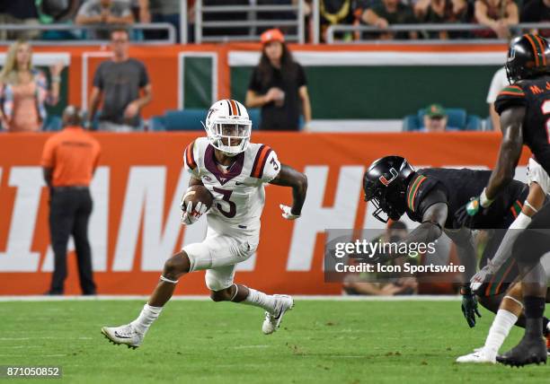 Virginia Tech defensive back Greg Stroman returns a punt during an NCAA football game between the Virginia Tech Hokies and the University of Miami...