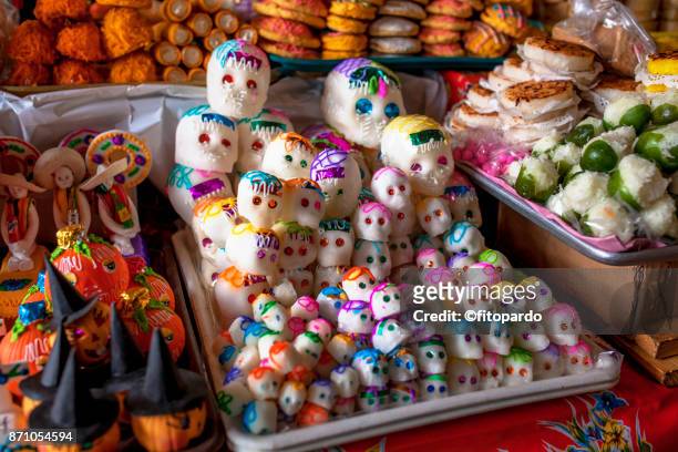 day of the dead candies and traditional sweets - sugar skull stockfoto's en -beelden
