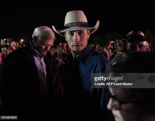 Johnnie Langendorff, one of the two men who chased after suspected killer Devin Kelley, looks on during a vigil in Sutherland Springs, Texas on...