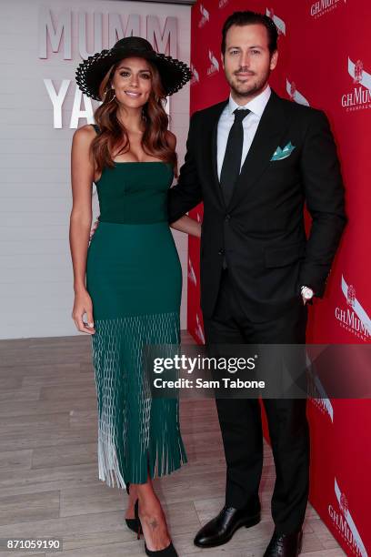 Pia Miller and Tyson Mullane poses at the Mumm Marquee on Melbourne Cup Day at Flemington Racecourse on November 7, 2017 in Melbourne, Australia.