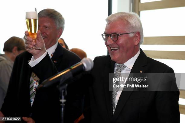 German President Frank-Walter Steinmeier raises a glass for a toast to the German and New Zealand Chamber of Commerce in the PWC Building on November...