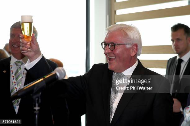 German President Frank-Walter Steinmeier raises a glass for a toast to the German and New Zealand Chamber of Commerce in the PWC Building on November...