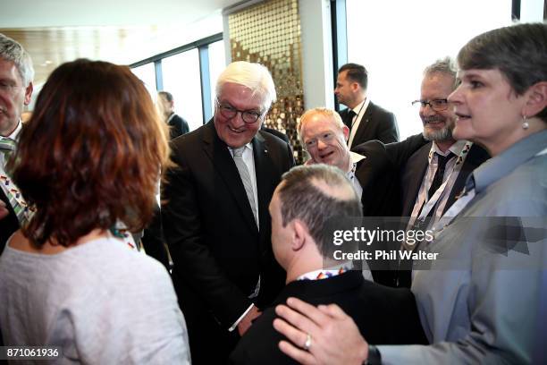 German President Frank-Walter Steinmeier meets guests at the German and New Zealand Chamber of Commerce in the PWC Building on November 7, 2017 in...