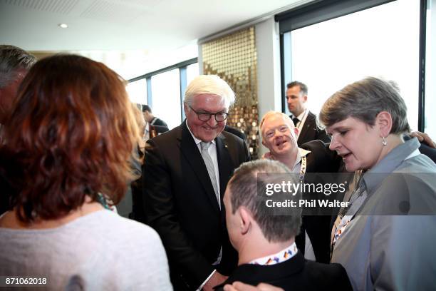German President Frank-Walter Steinmeier meets guests at the German and New Zealand Chamber of Commerce in the PWC Building on November 7, 2017 in...