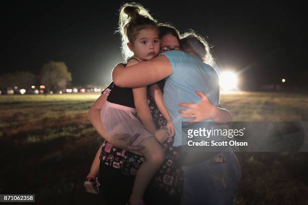 People mourn the 26 victims killed at the First Baptist Church of Sutherland Springs during a prayer service on November 6, 2017 in Sutherland...