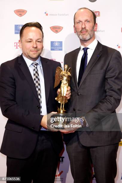 Award winner Daniel Roeder and Alexander Feiherr Knigge during the VDZ Publishers' Night at Deutsche Telekom's representative office on November 6,...