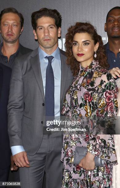 Actors Jon Bernthal and Amber Rose Revah attend the "Marvel's The Punisher" New York premiere at AMC Loews 34th Street 14 theater on November 6, 2017...