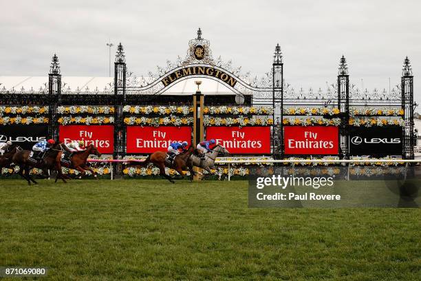 Jockey Stephen Baster rides Our Crown Mistress to win race 6, the Lexus Hybrid Stakes, during Melbourne Cup Day at Flemington Racecourse on November...