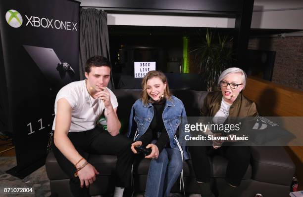 Brooklyn Beckham, Chloe Grace Moretz and Kate Yeager play Xbox One during an Xbox Live Session as Liam Payne, Chloe Grace Moretz, Brooklyn Beckham...