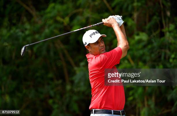 Arjun Atwal of India plays a shot during practice for the Resorts World Manila Masters at Manila Southwoods Golf and Country Club on November 7, 2017...