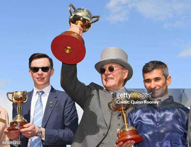 Trainer Joseph O'Brien, owner Lloyd Williams and jockey Corey Brown who rode Rekindling celebrates awinning race 7, the Emirates Melbourne Cup,...