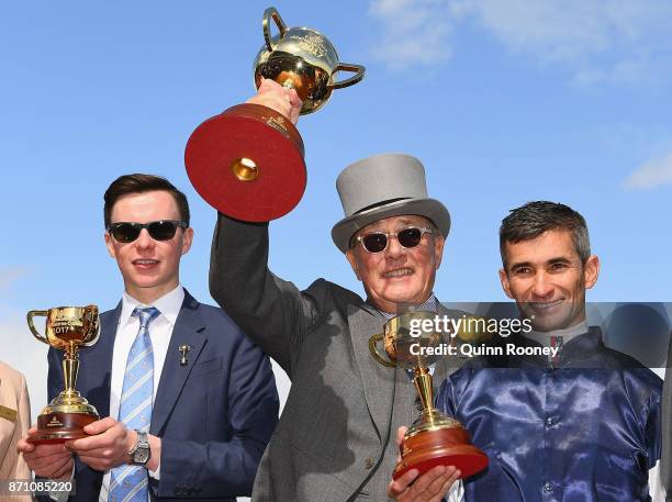 Trainer Joseph O'Brien, owner Lloyd Williams and jockey Corey Brown who rode Rekindling celebrates awinning race 7, the Emirates Melbourne Cup,...