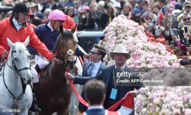 Corey Brown jockey on Rekindling congratulates trainer Joseph OBrien after they won the 157th Melbourne Cup at Flemington Racecourse in Melbourne on...