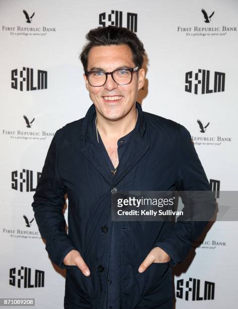 Director Joe Wright poses for photos on the red carpet for "Darkest Hour" at the Castro Theatre on November 6, 2017 in San Francisco, California.