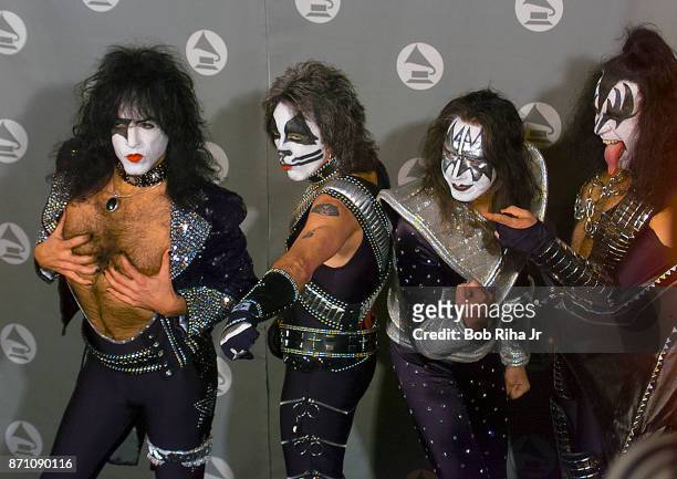Band members : Paul Stanley, Eric Singer, Tommy Thayer and Gene Simmons backstage at the Grammy Awards Show on February 28, 1996 in Los Angeles,...