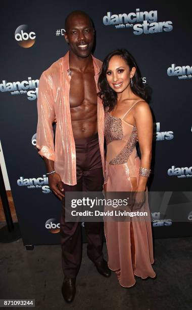 Former NFL player Terrell Owens and dancer Cheryl Burke pose at "Dancing with the Stars" season 25 at CBS Televison City on November 6, 2017 in Los...