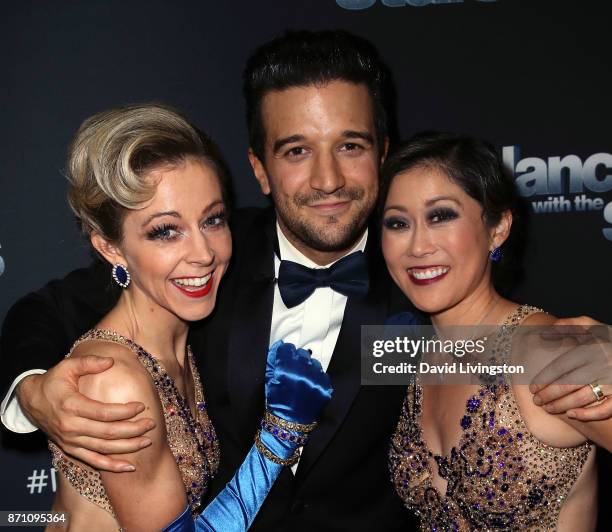 Violinist Lindsey Stirling and Olympic champion Kristi Yamaguchi pose with dancer Mark Ballas at "Dancing with the Stars" season 25 at CBS Televison...